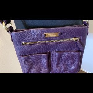 Cole Haan deep purple crossbody bag.